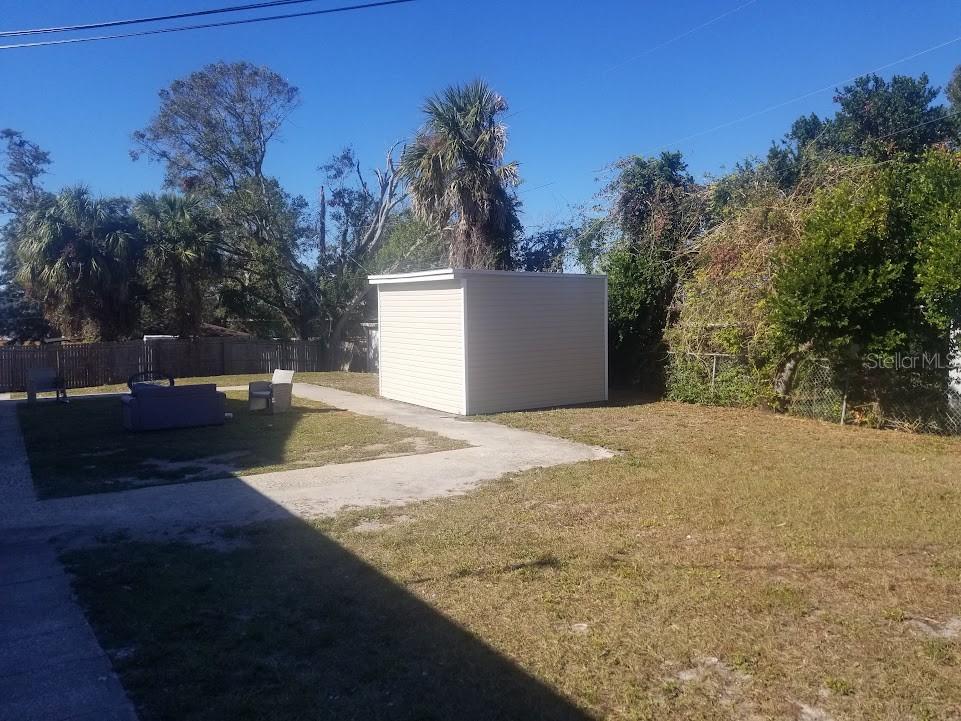 Double lot yard with shed