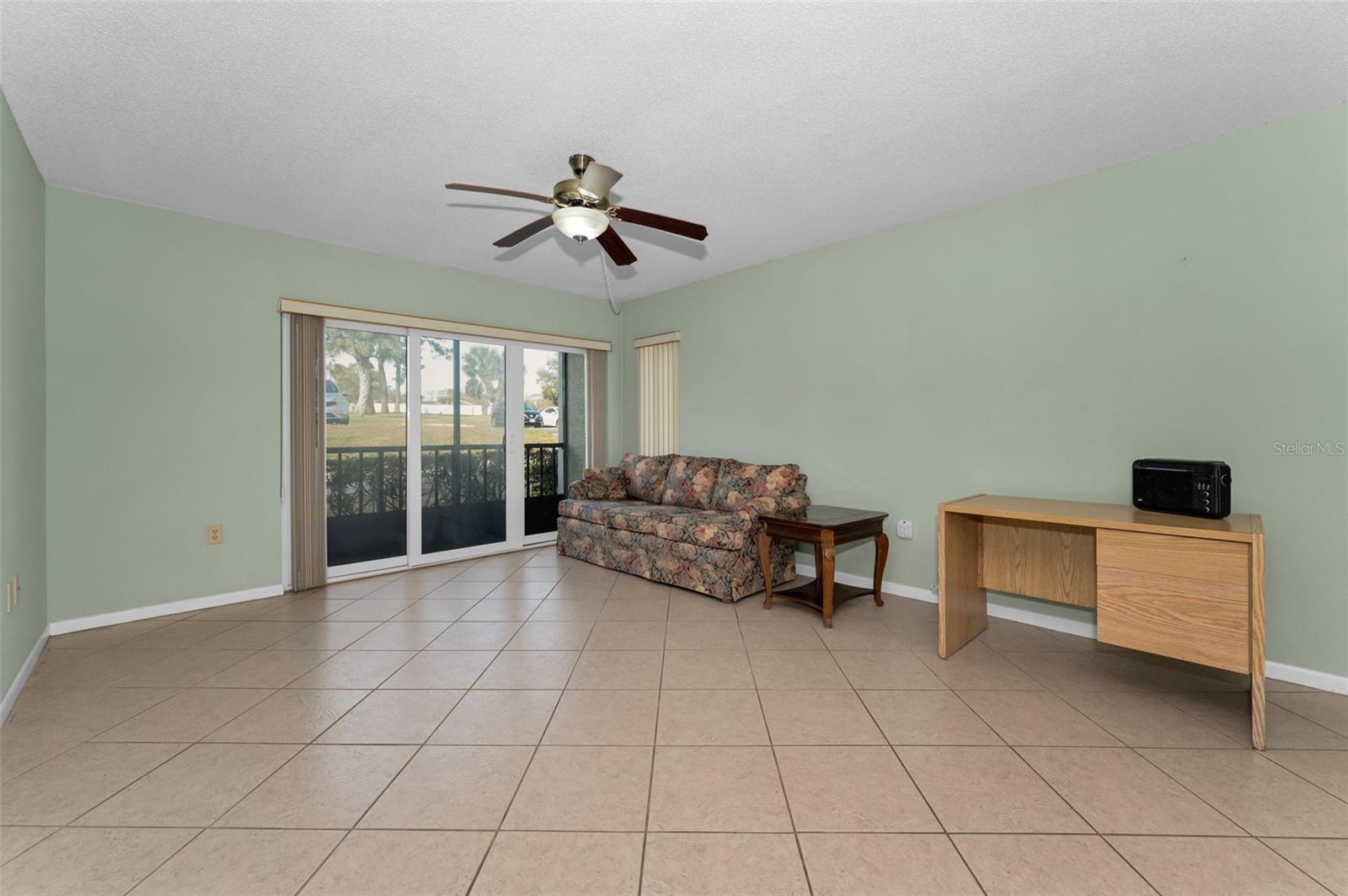 View of living room toward patio