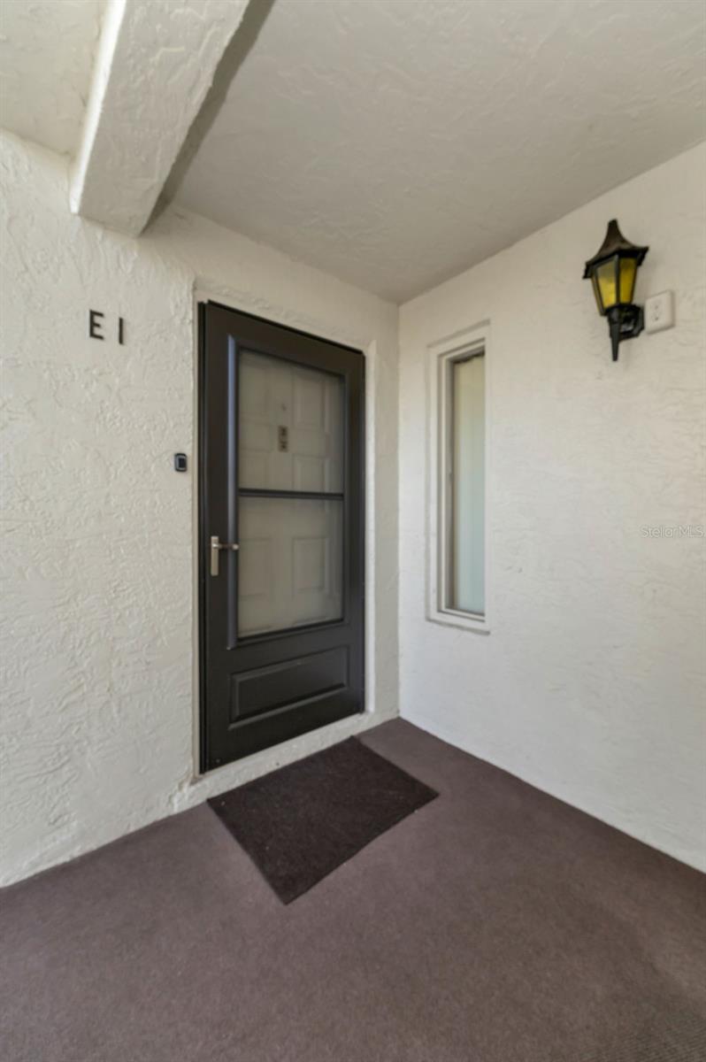 Front Entrance with a quality storm door