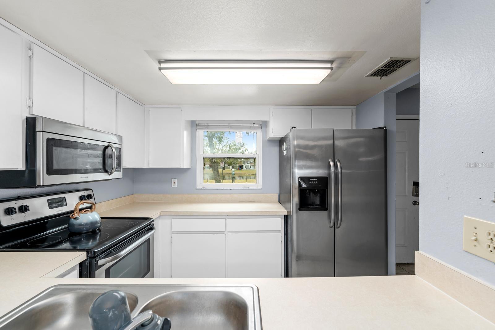 KITCHEN FROM DINING AREA