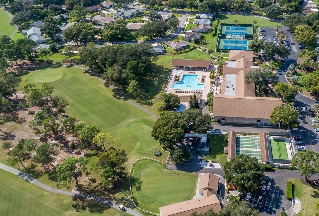 Main campus of Highland Lakes with part of golf course, clubhouse and recreational amenities