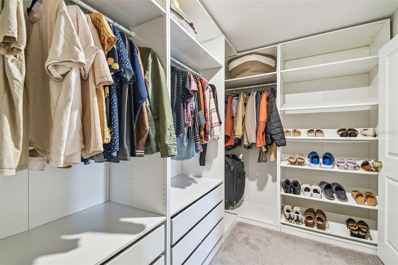 Walk-in Closet with closet organizer