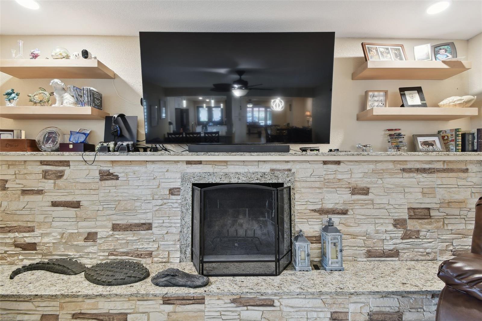 Family Room With Fireplace and Beautiful Built In Shelves