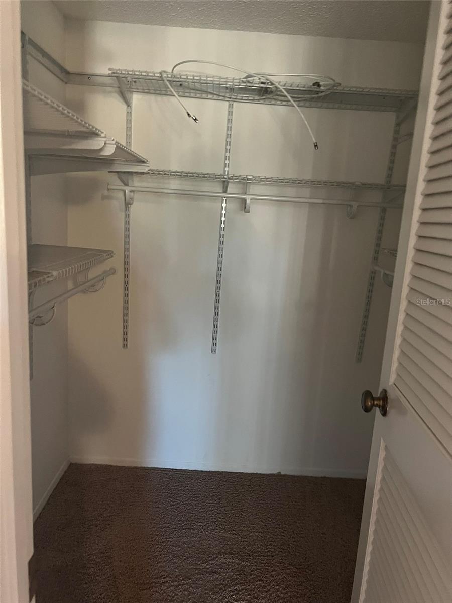 Primary walk in closet 1