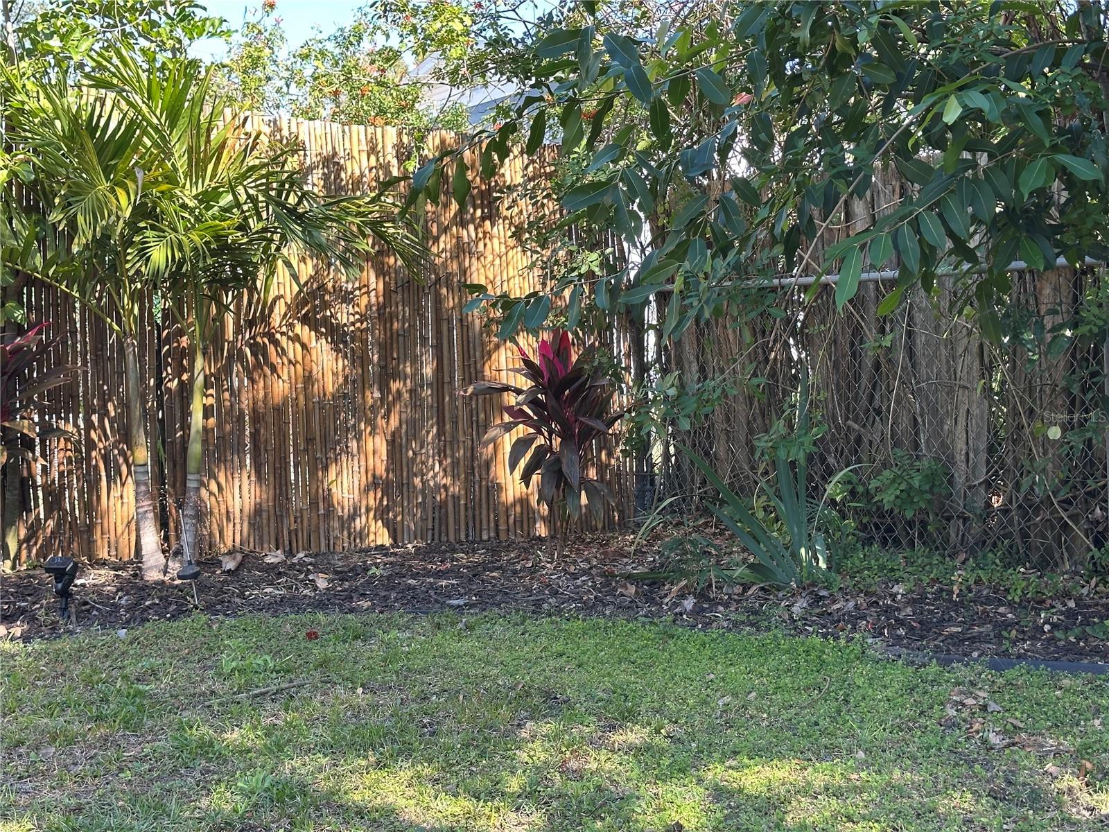 Nicely landscaped with bamboo fencing