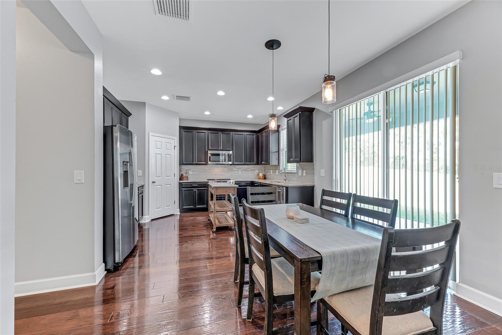 There's ample space for a large kitchen table, perfect for family gatherings and shared meals