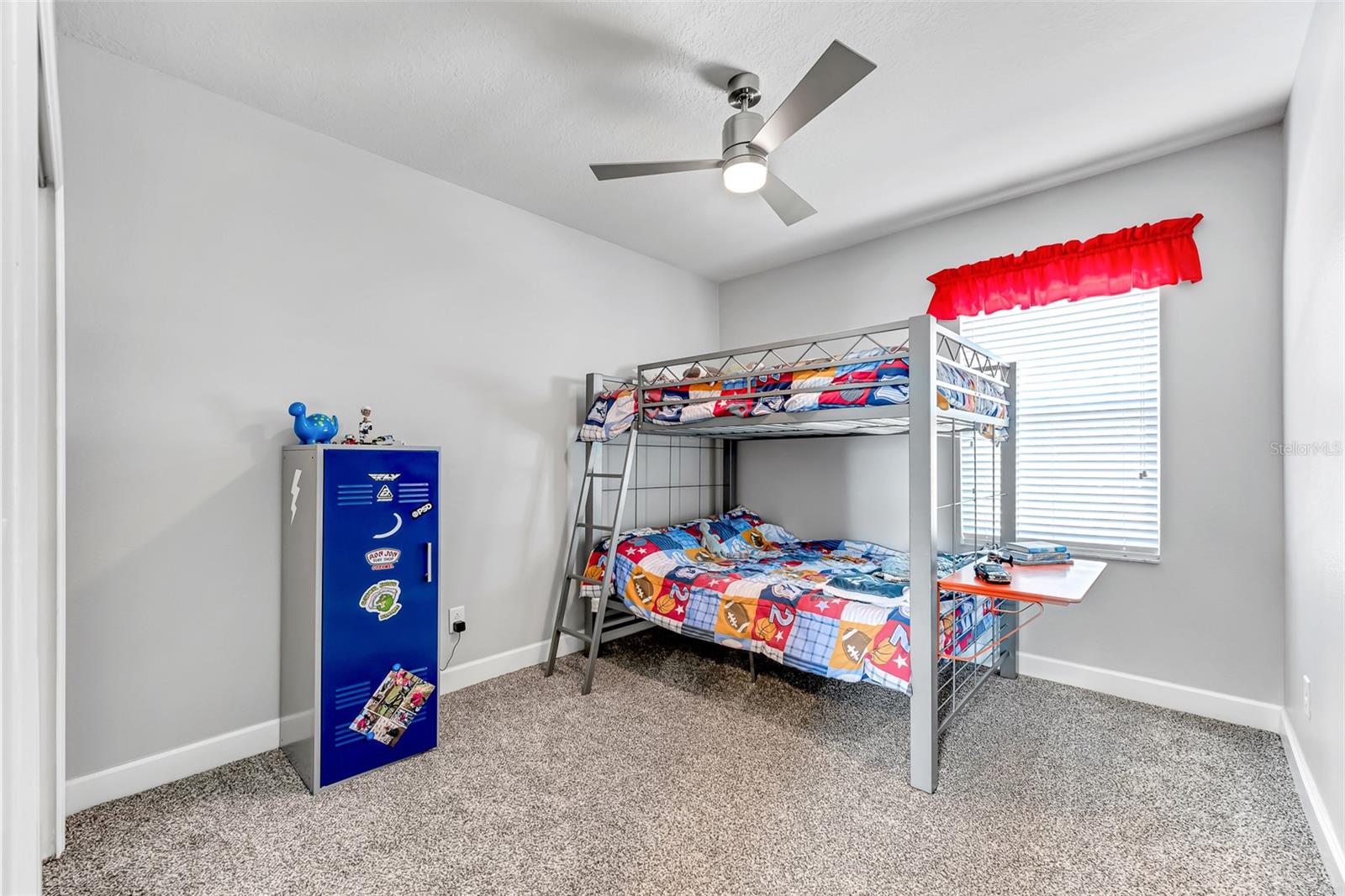 Secondary bedroom #4 on 2nd floor is 12' x 11' and has a roomy built-in closet, stylish ceiling fan and newer plush carpeting.