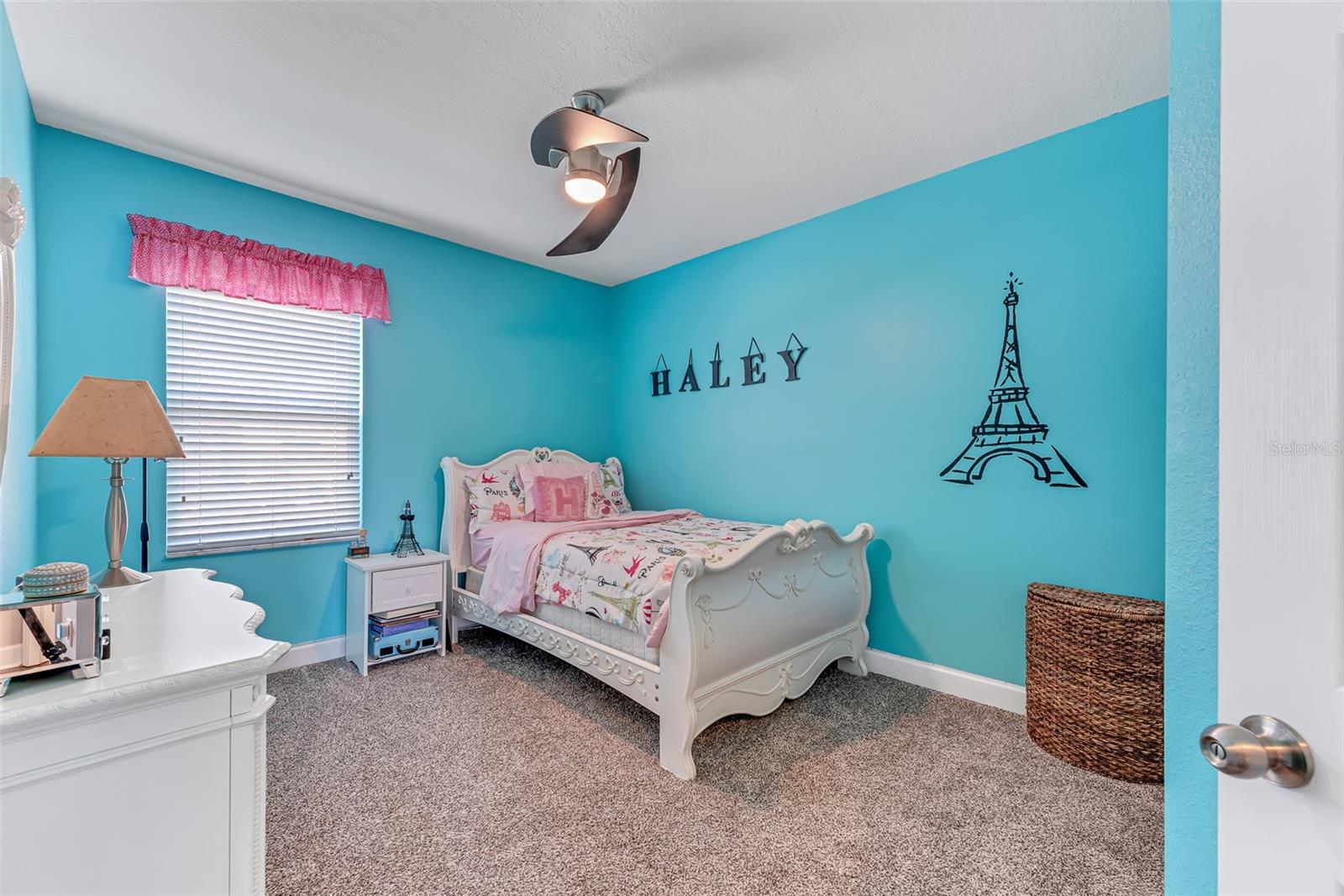 Secondary bedroom #3 on 2nd floor is 12' x 11' and has a roomy built-in closet, stylish ceiling fan and newer plush carpeting.