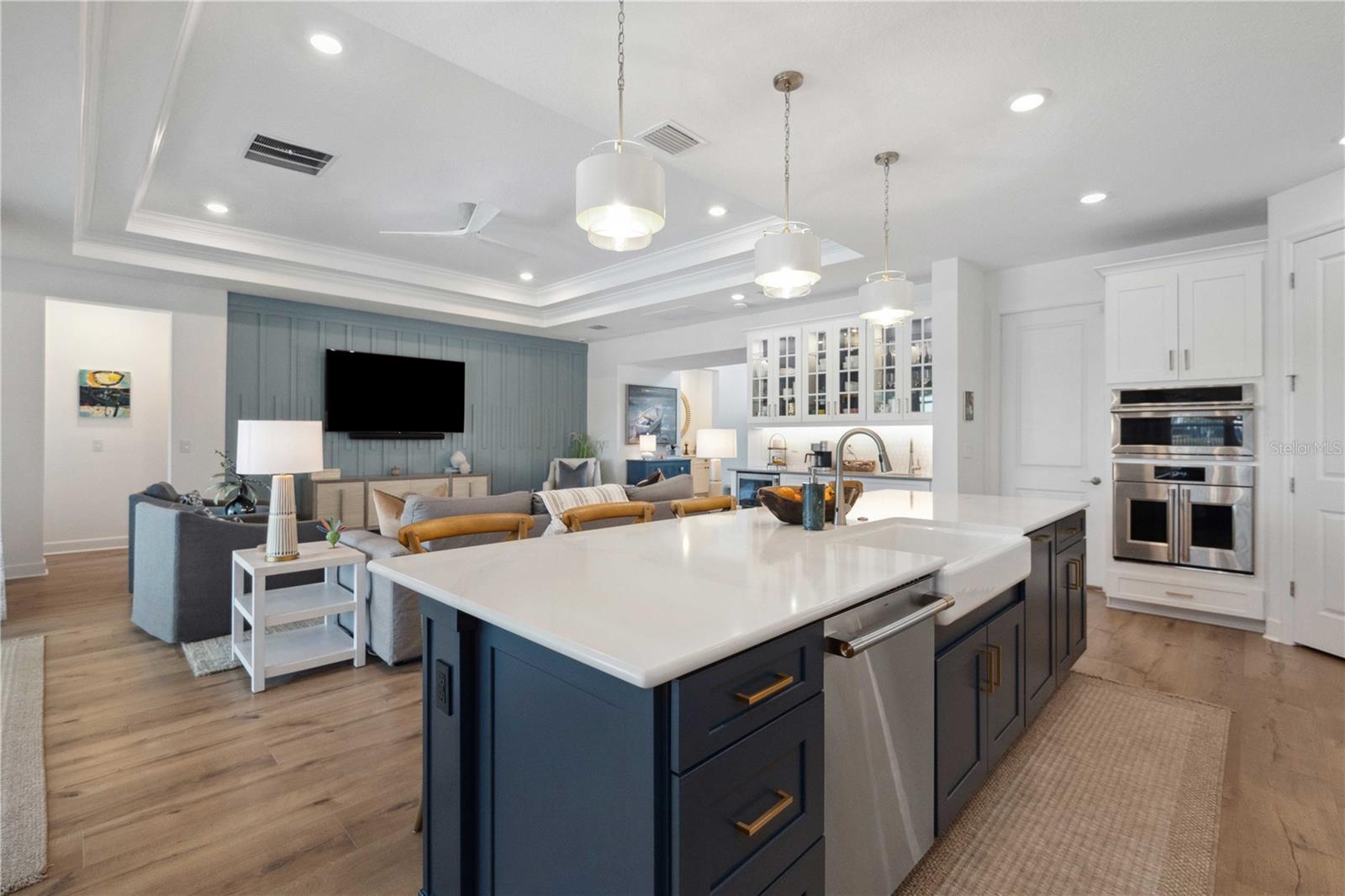 Chef's Kitchen with Stone Countertops and a Breakfast Bar