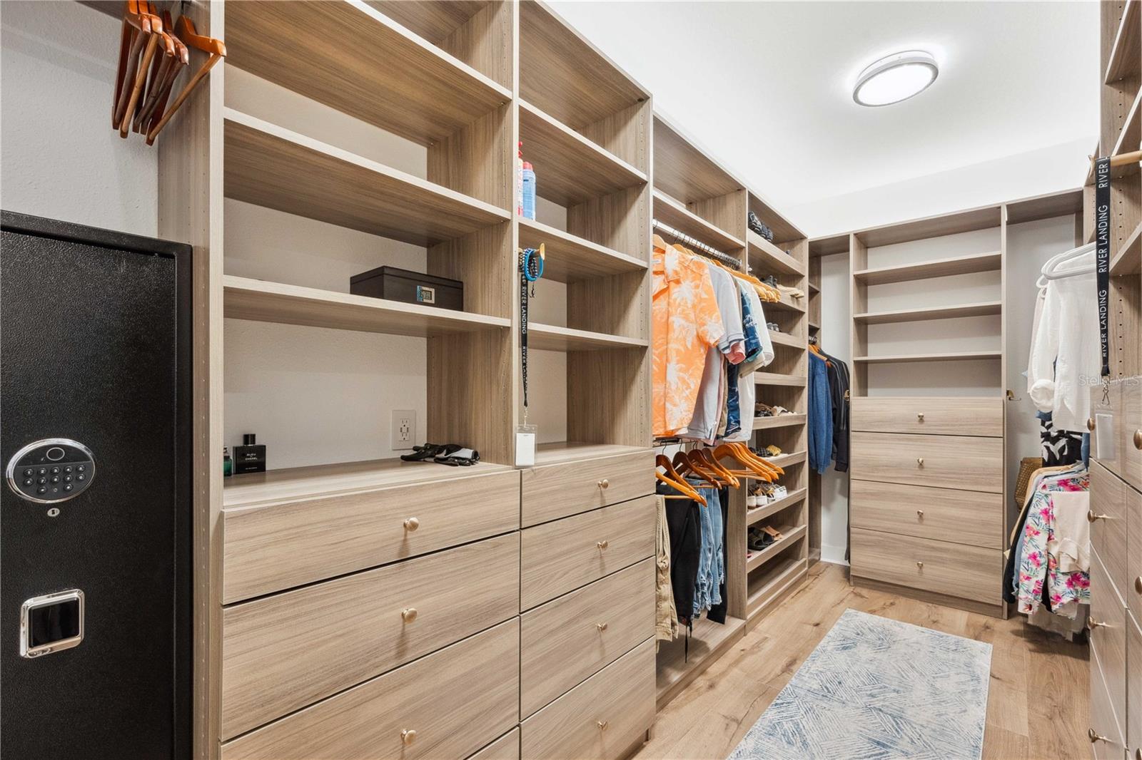 Primary Closet with Custom Inserts First Floor