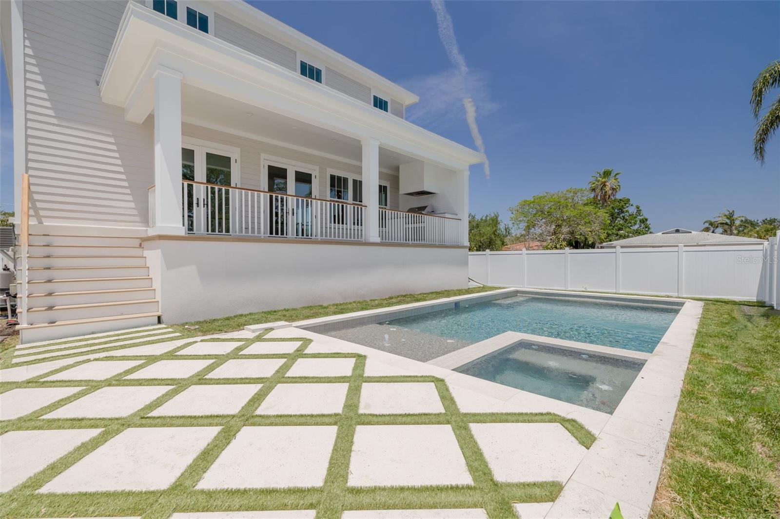 The backyard/ pool area.