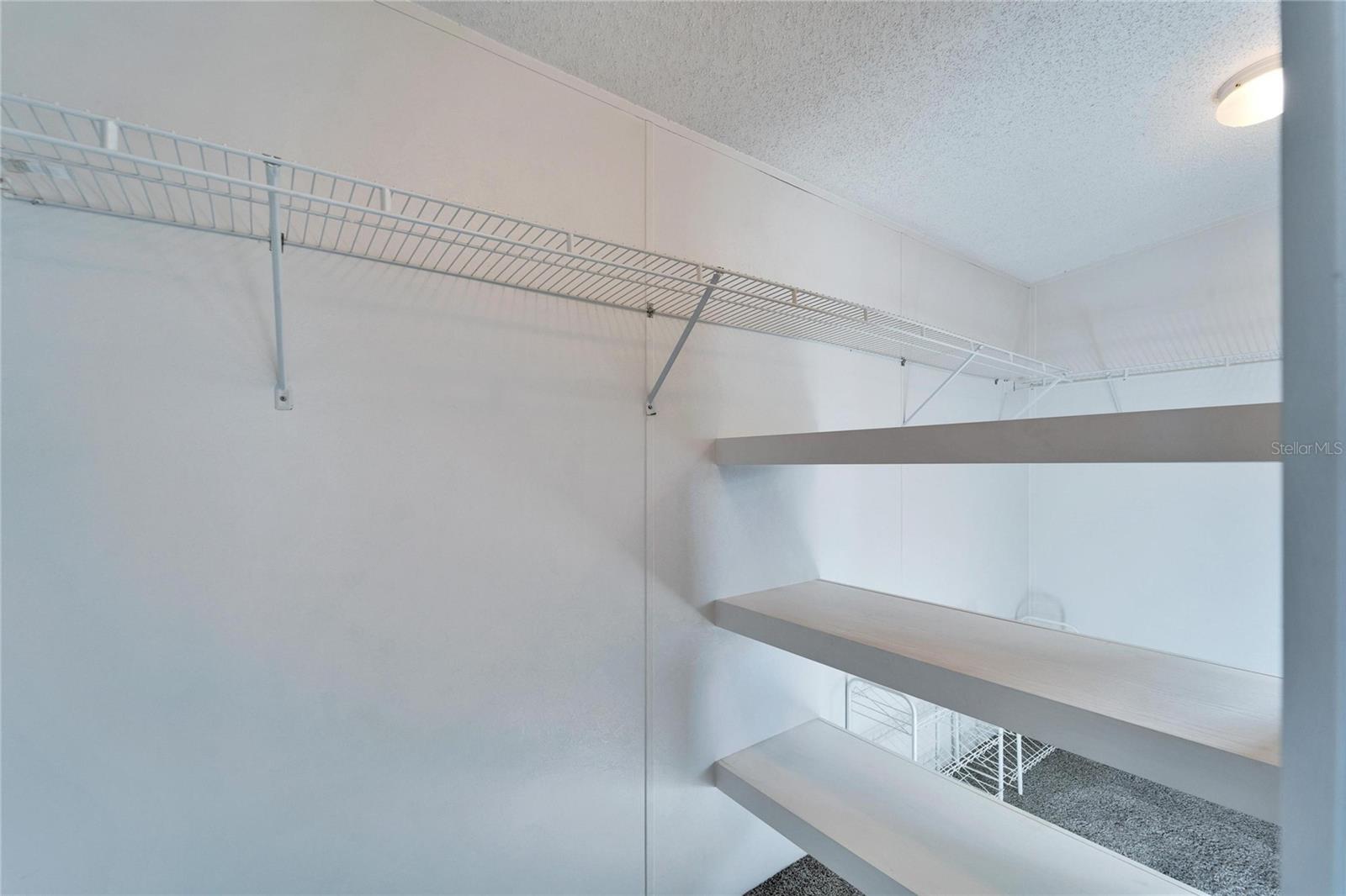 Primary Closet (walk-in with 2 sliding doors)