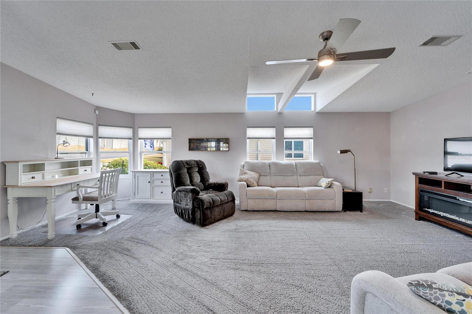 Spacious living room with lots of natural light