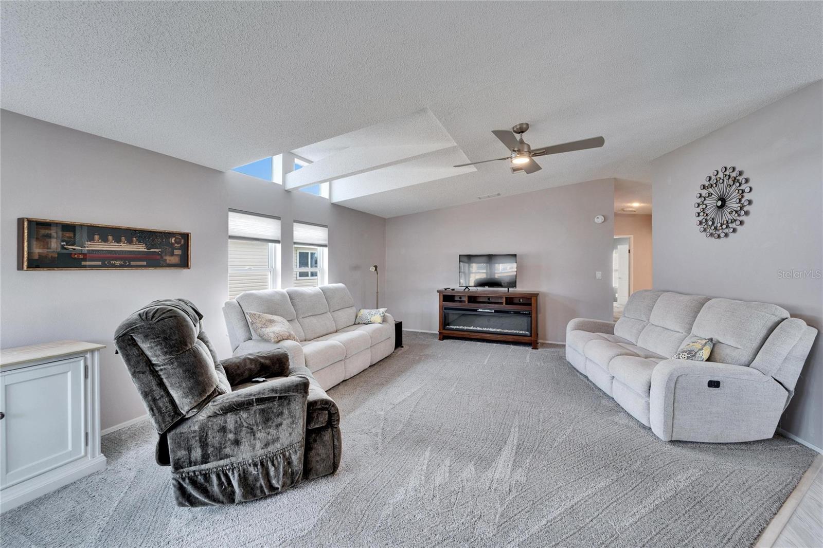 Spacious living room with lots of natural light