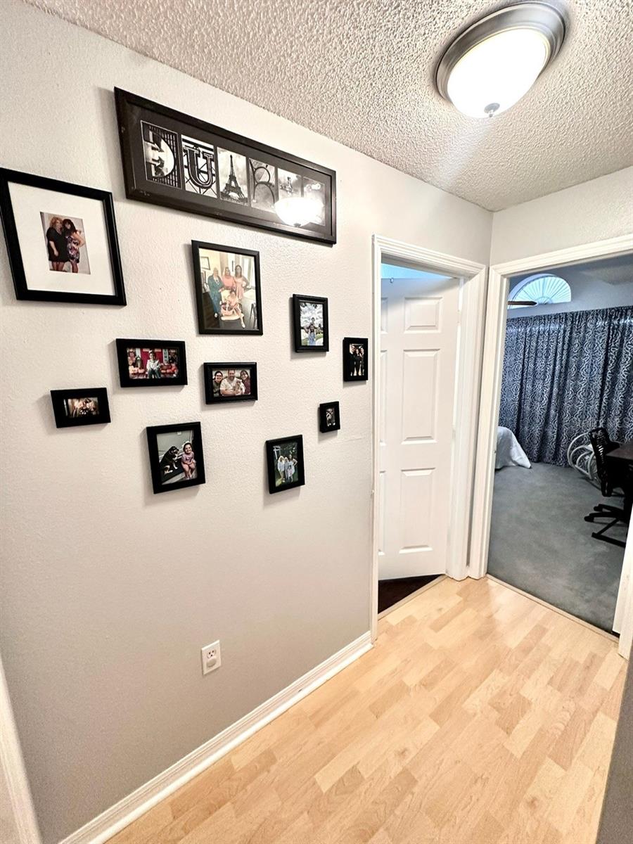 Hallway to Secondary Bath and Bedroom 4