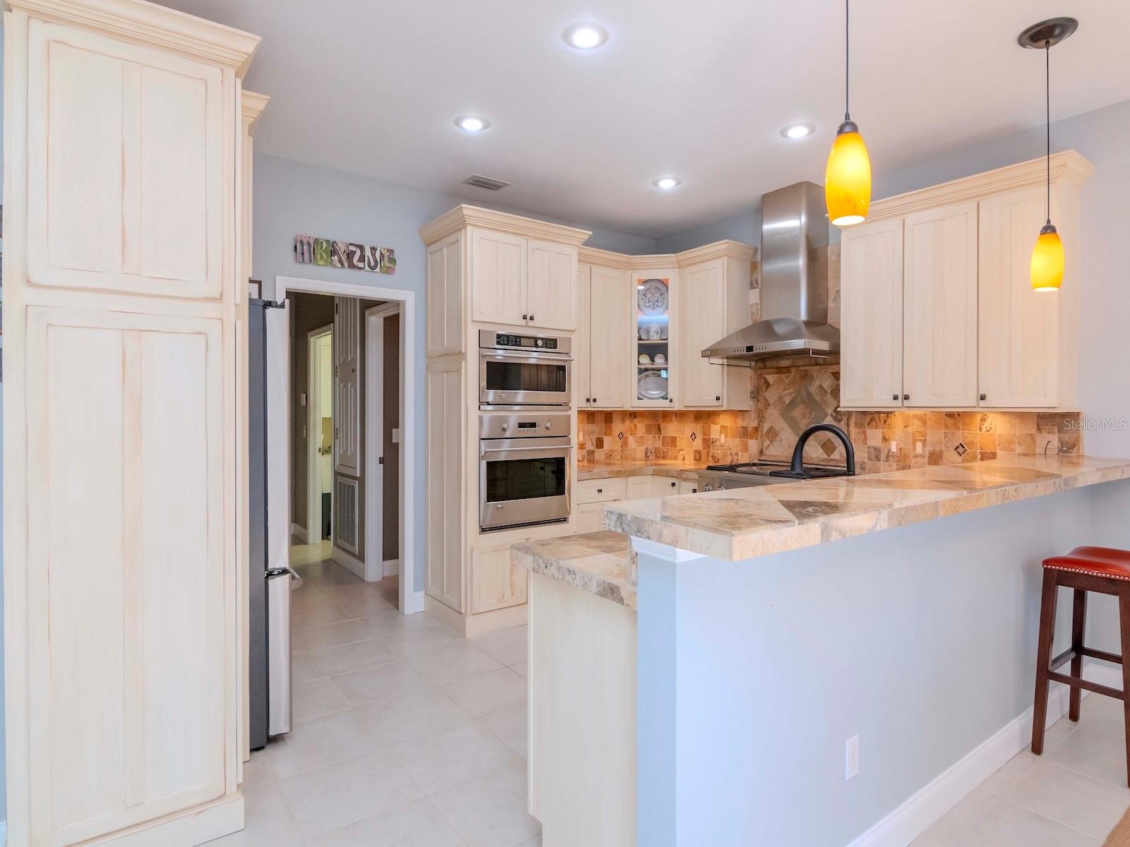 Renovated kitchen with many designer finishes and touches