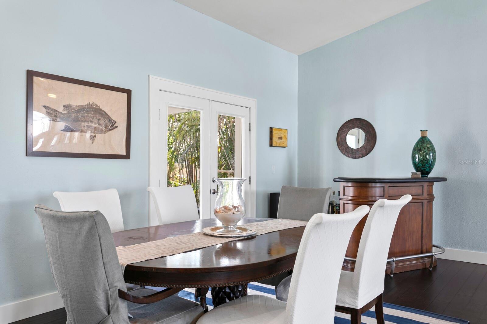 Dining room with French doors leading out to the backyard