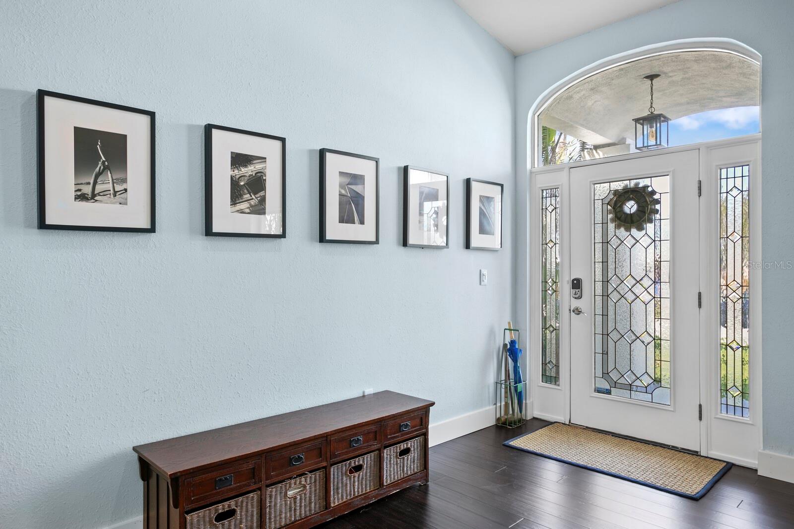 The spacious foyer entry opens to the main living areas