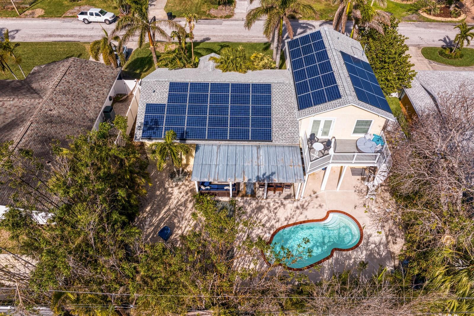 This home includes a complete Tesla solar panel system