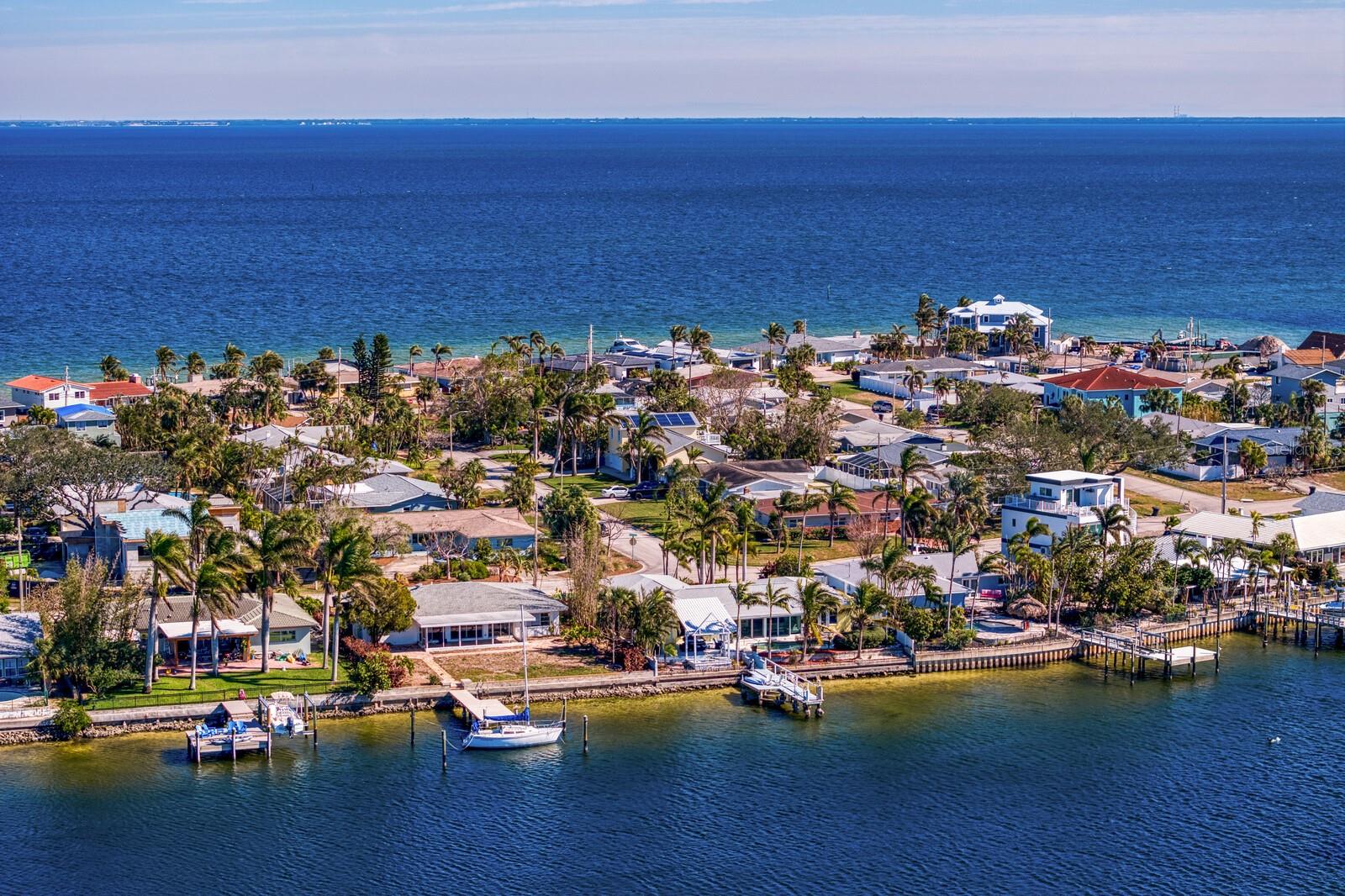 Enjoy island living in this quaint waterfront community