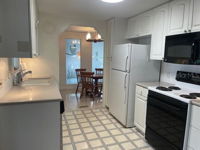 KITCHEN BREEZWAY TO DINING