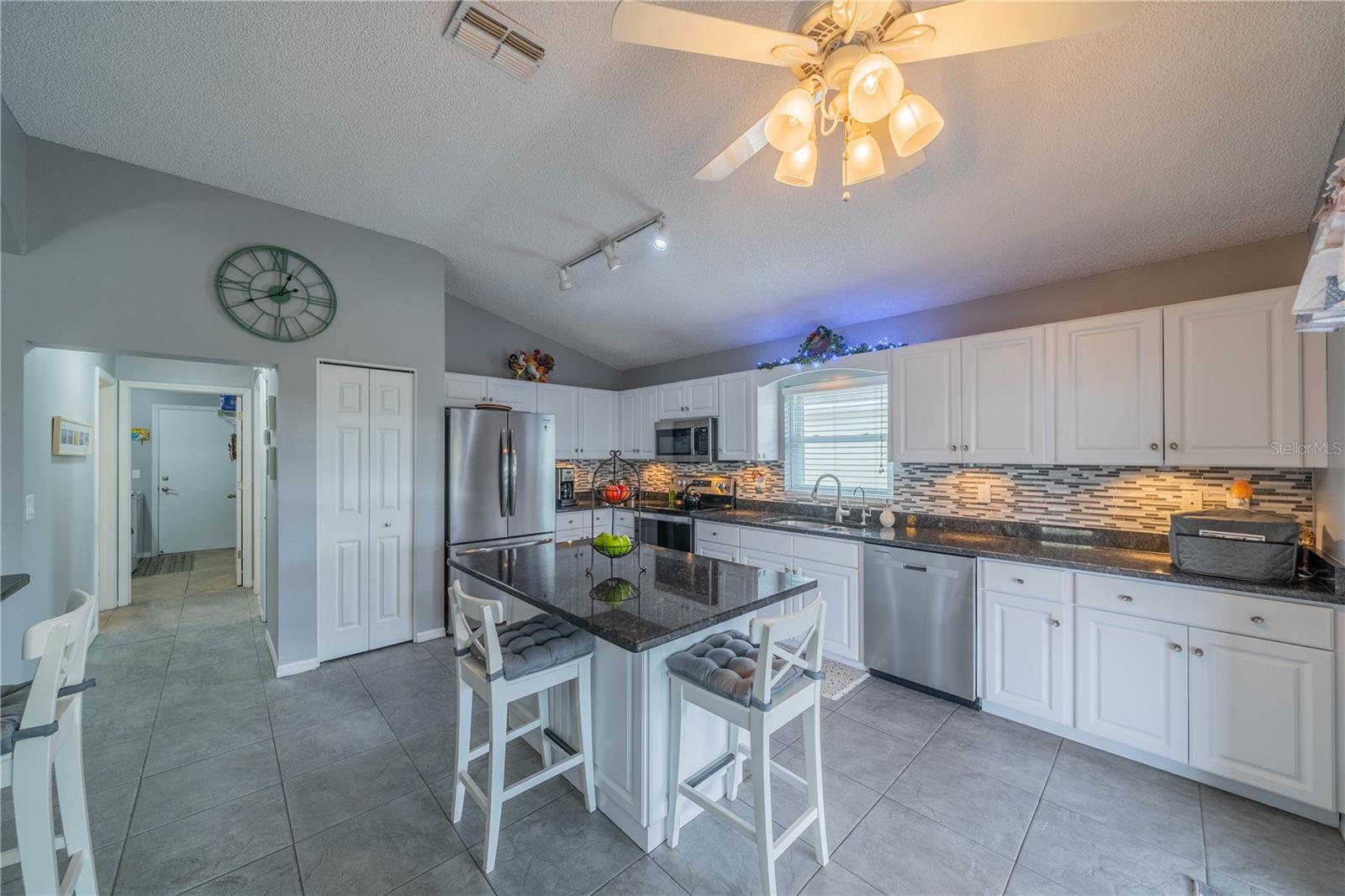 Kitchen (Looking toward guest suite and laundry)