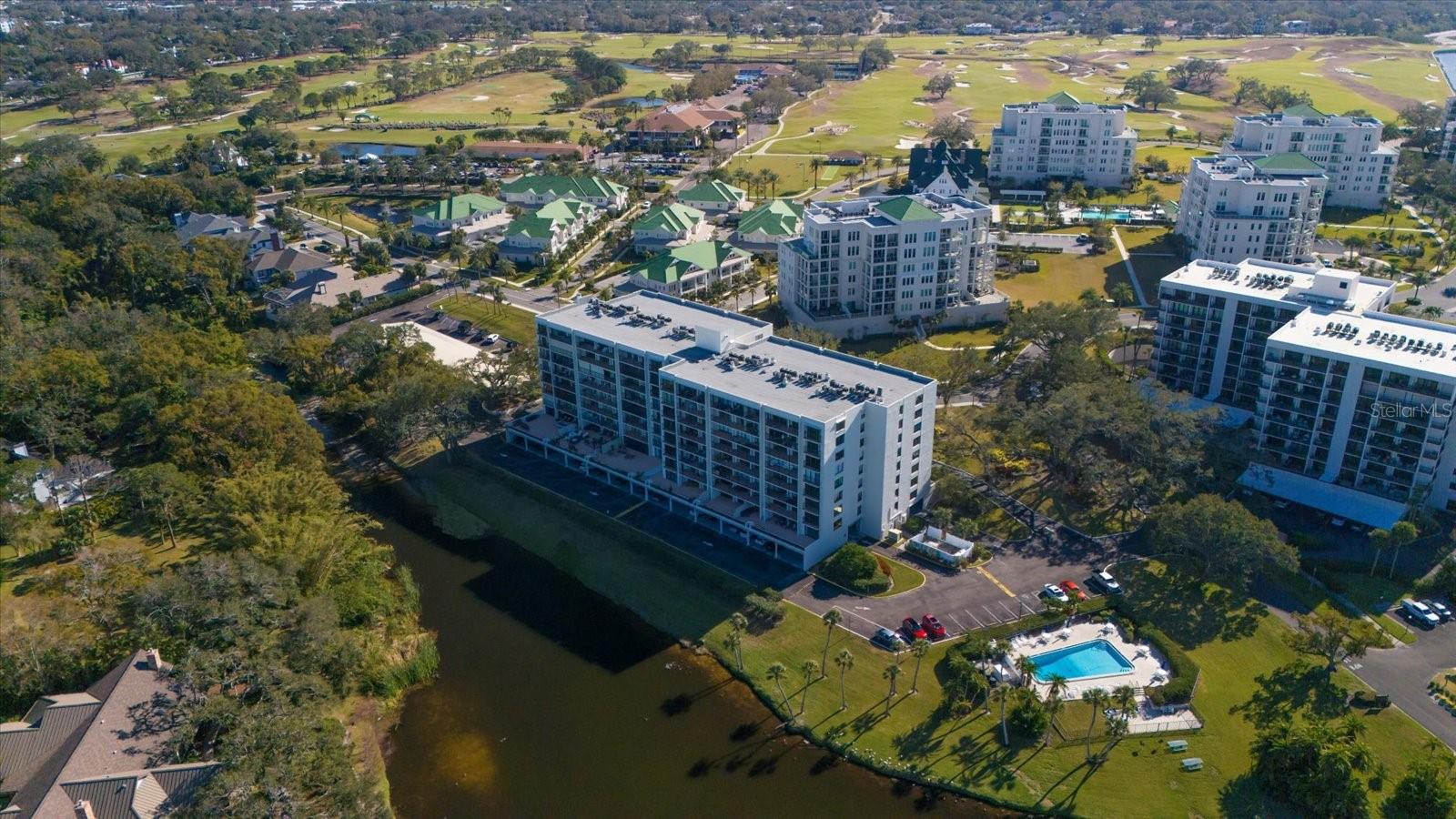 Aerial view of the building and the golf course beyond