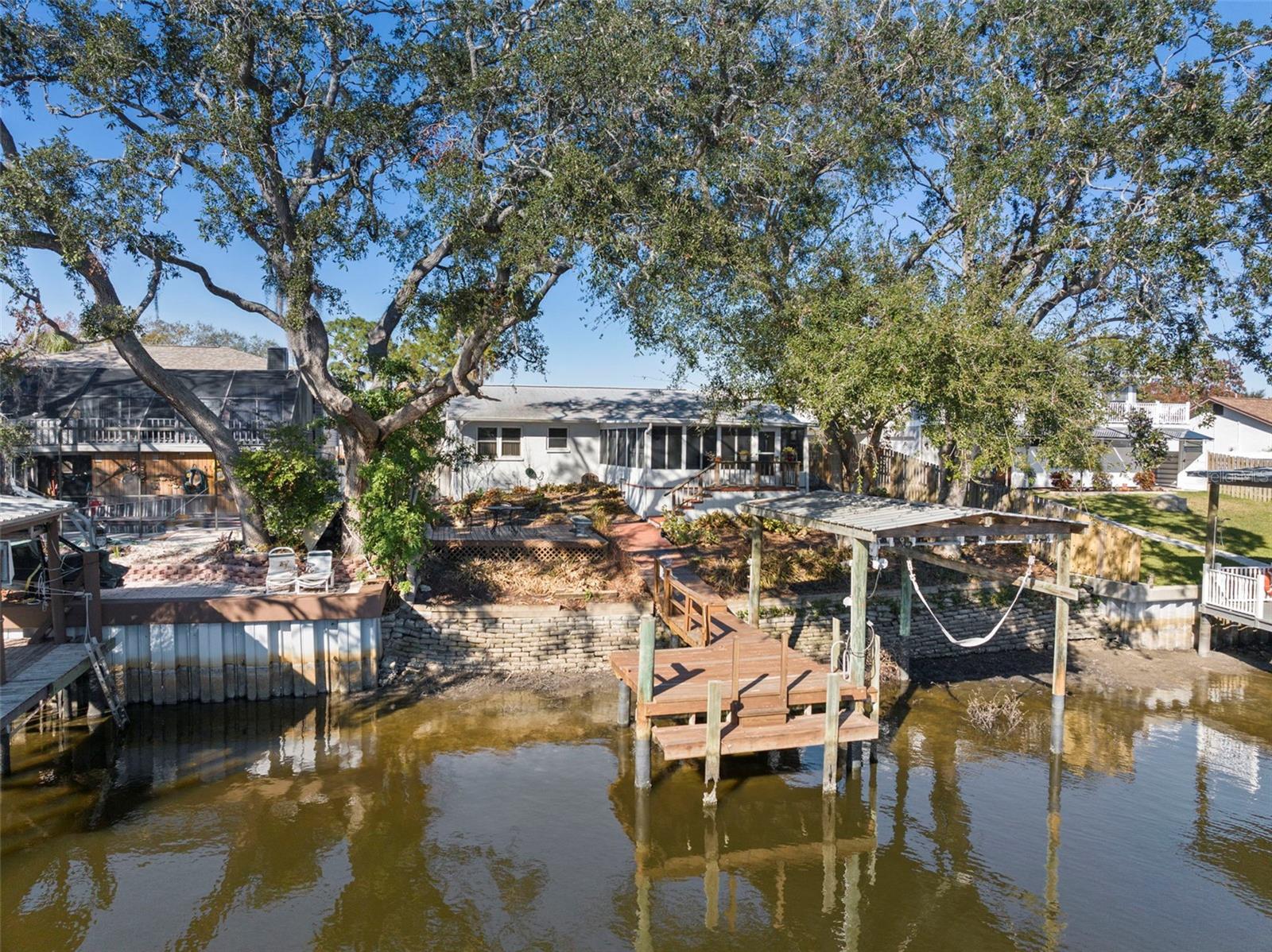 Water access with 60 ft seawall and private dock