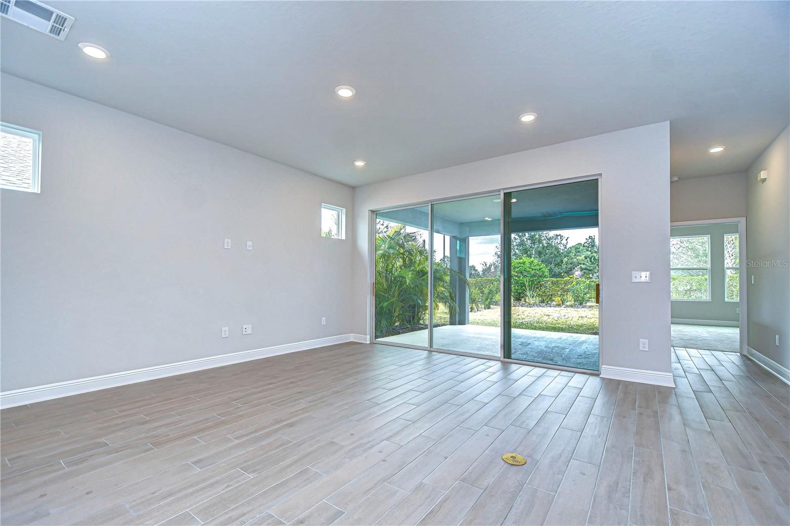 Gorgeous sliding glass doors lead out to the patio.