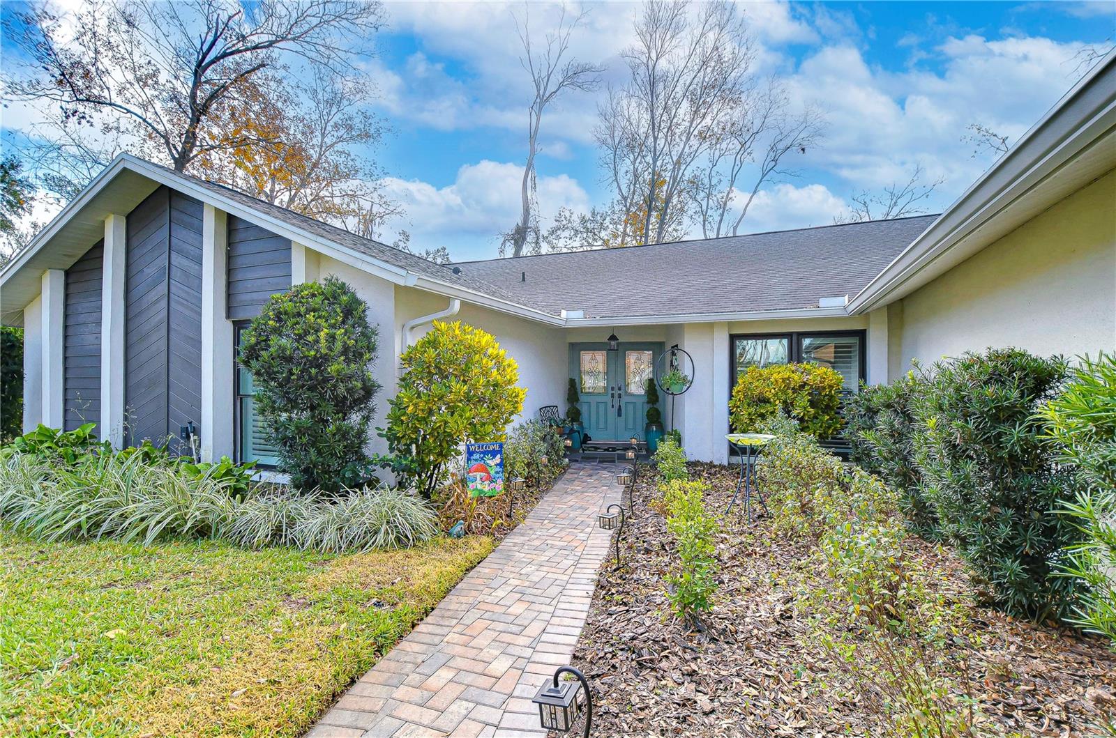 Pavered path leads you into this fantastic home!