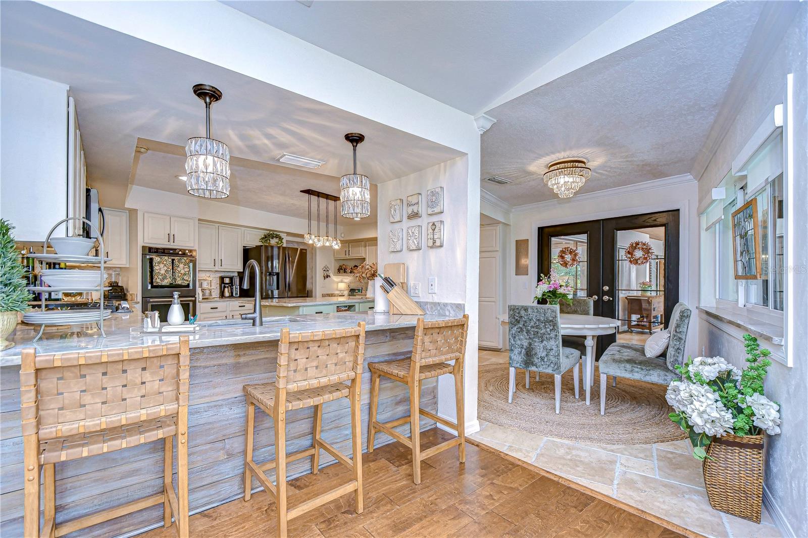 This kitchen is both opulent and welcoming!