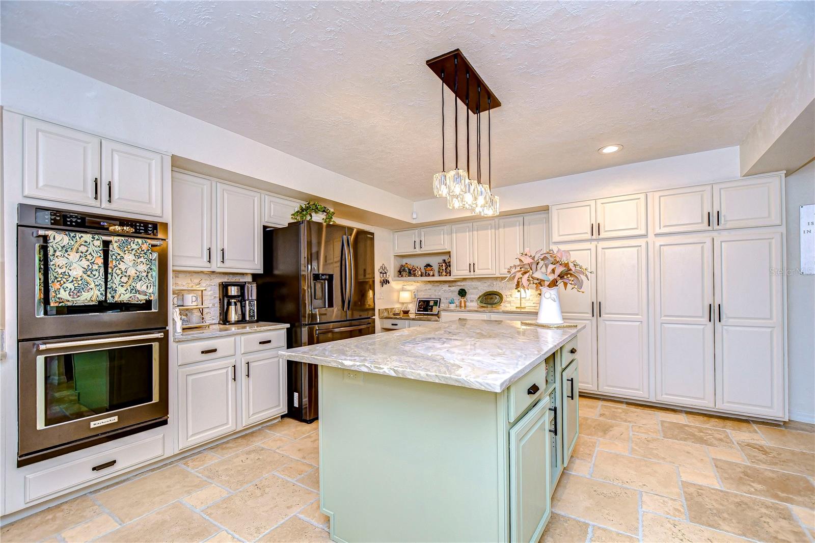 Beautiful cabinetry, stunning countertops, and statement lighting are sure to elevate the space aesthetically.