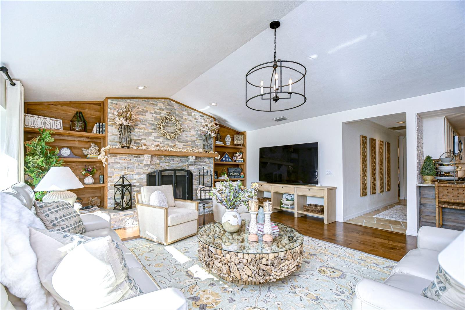 Gorgeous fire place with built ins and stone accenting!