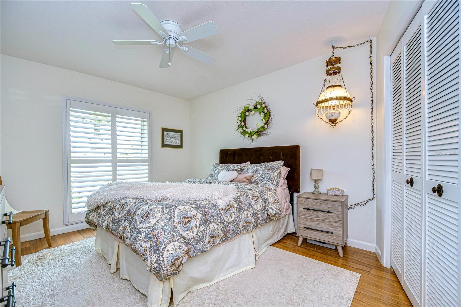 Second bedroom with large plantation shuttered window!