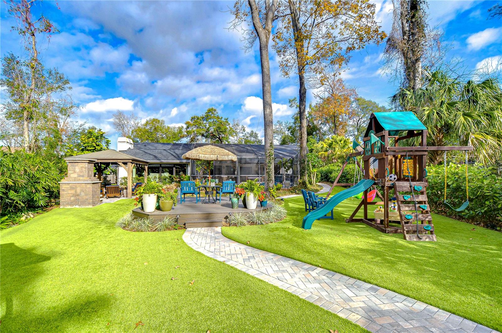 STUNNING backyard space with SO many amenities!