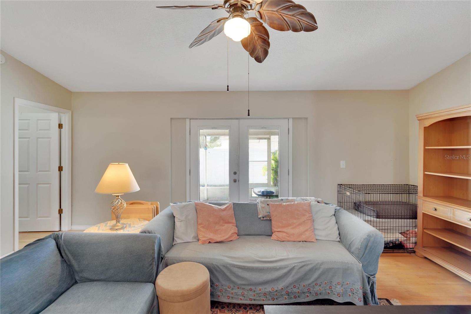 Living room With Hardwood Floors and view to back yard