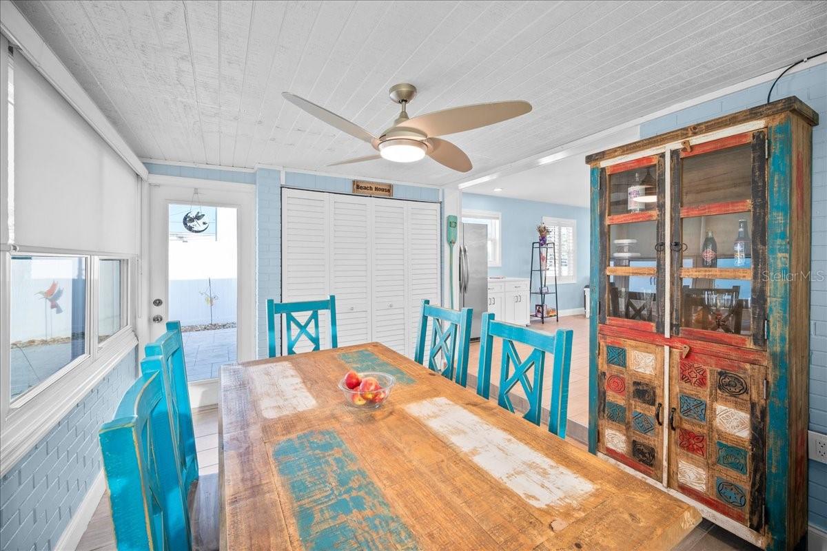 Dining area/Flex space, the white doors are the washer/dryer room