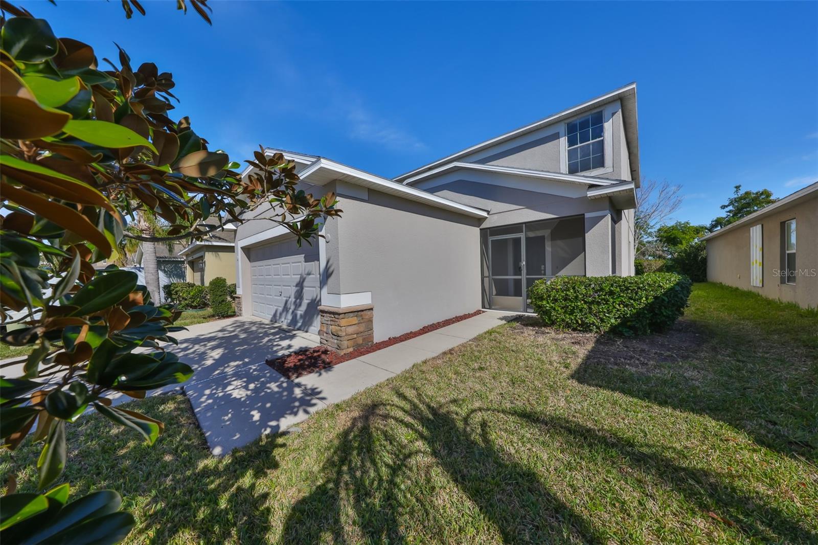 Screened front entry to this 3 bed 2 1/2 bath home