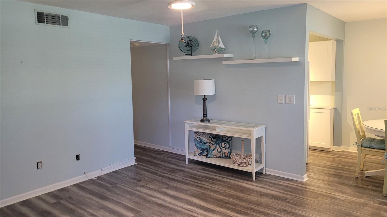 Light and bright living room with luxury plank vinyl floors.