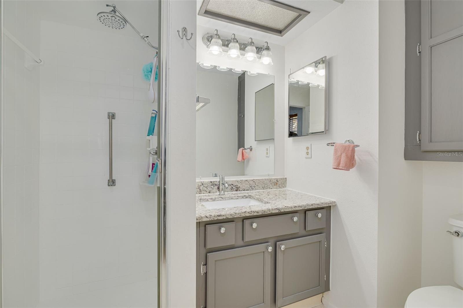 New sink, faucet and granite counters in primary bathroom!