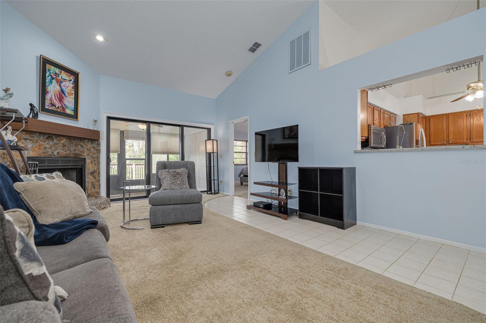 Hurricane-rated sliders to the screened sunroom!