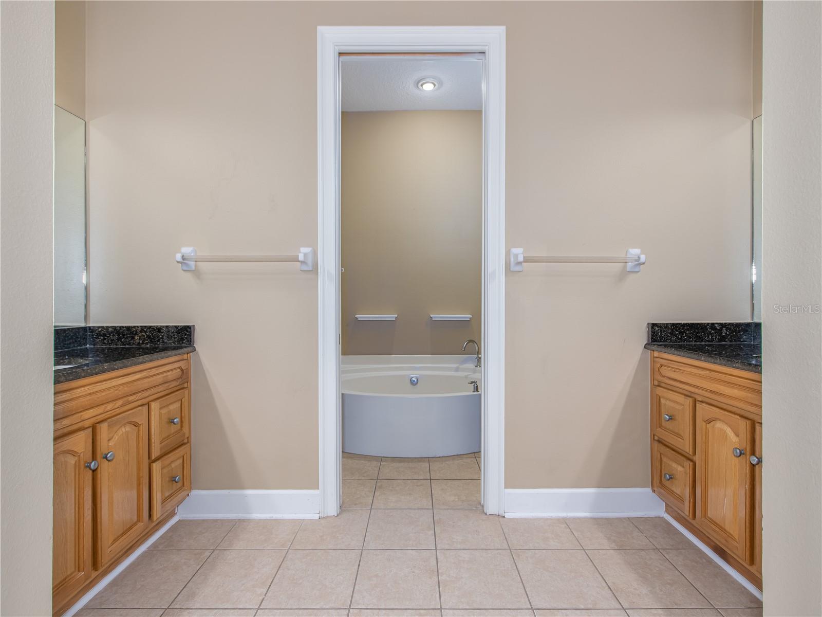 Ensuite bathroom with separate vanities