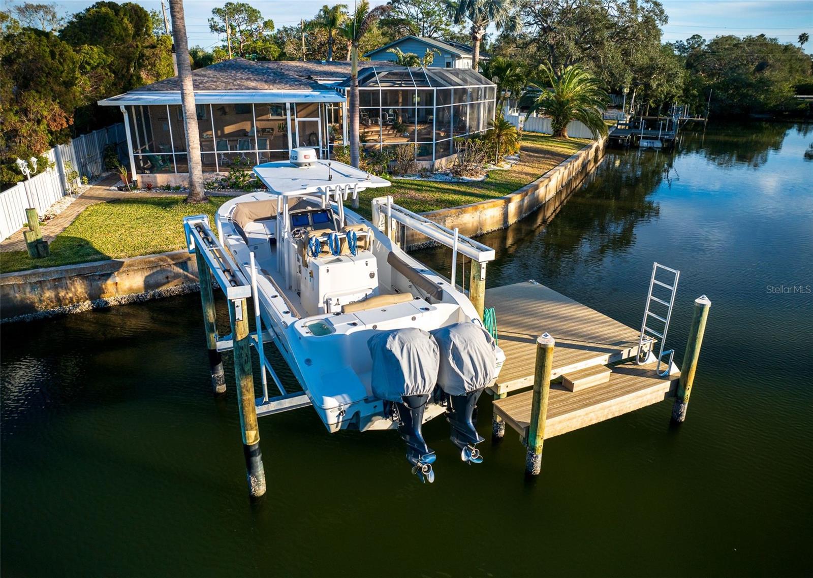 High elevation! Waterfront Oasis for boaters who are looking for stress free living with 11 foot elevation-a  rare find.