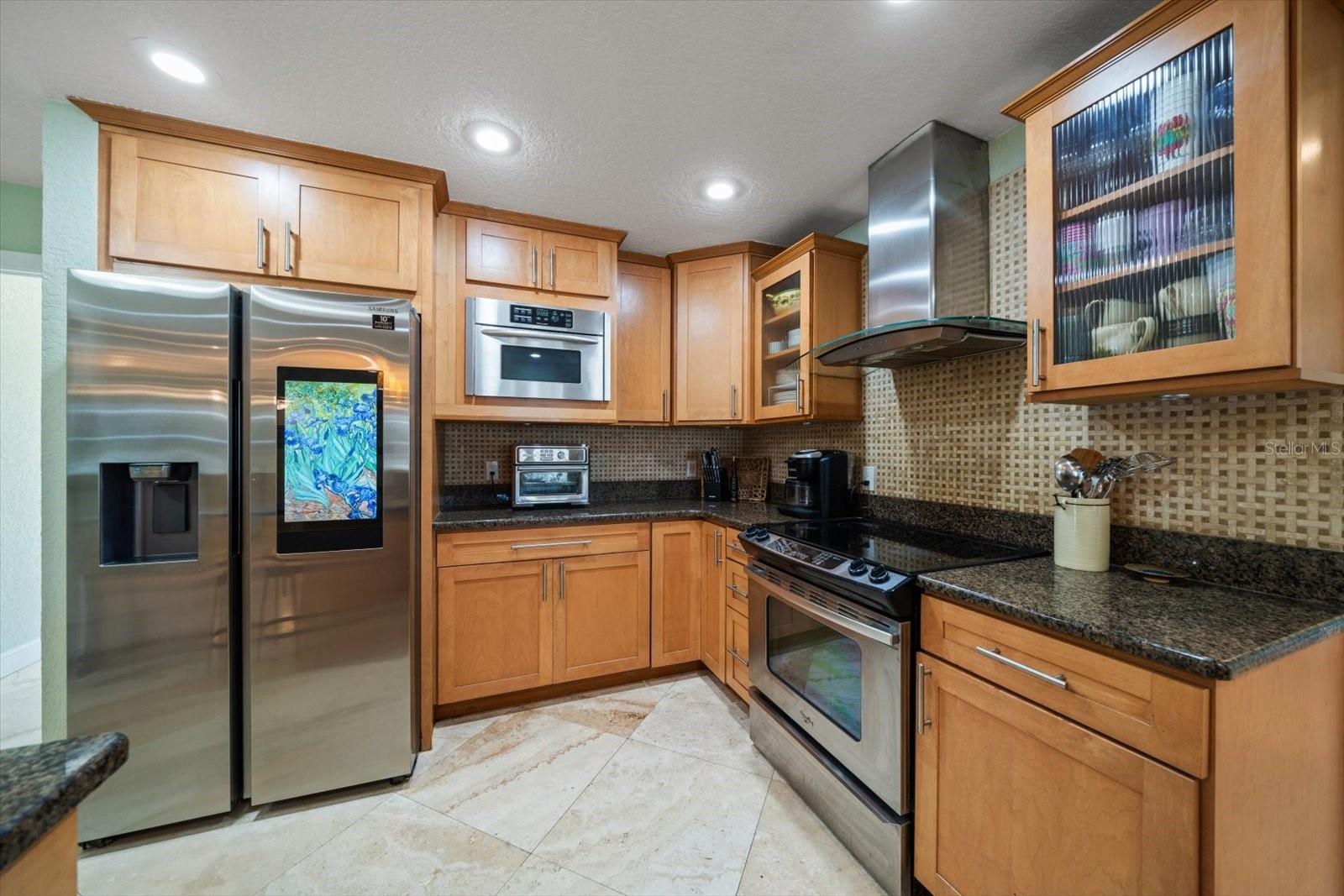 Storage space abounds in the kitchen area!