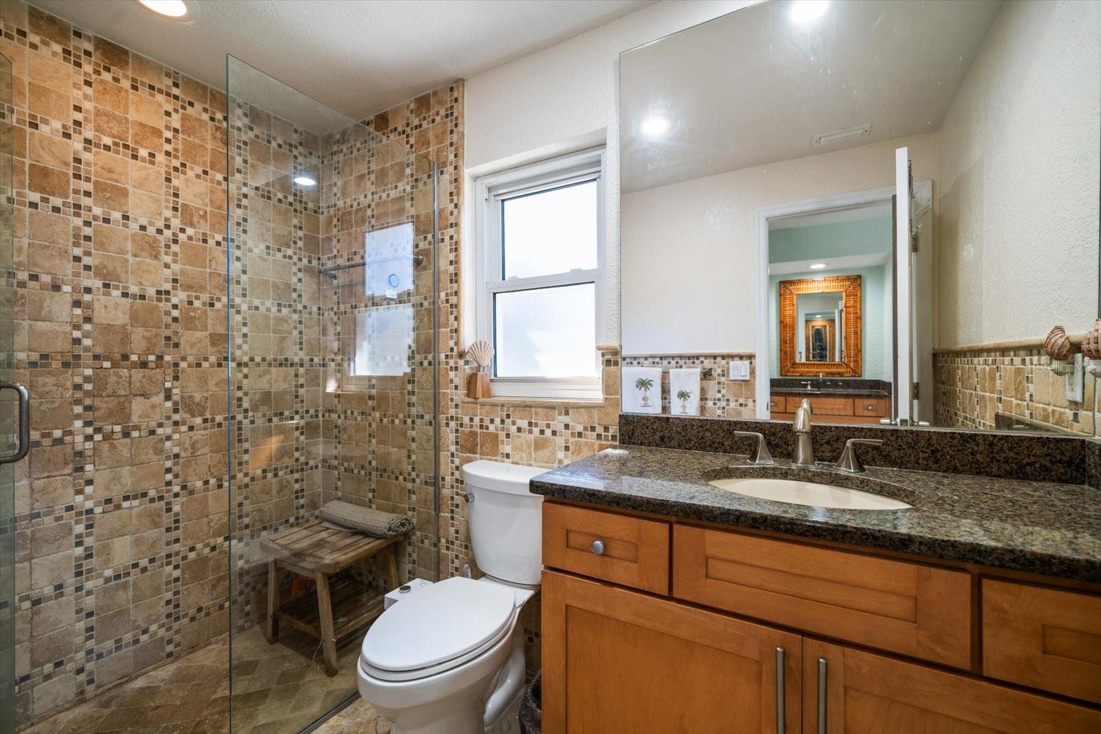 Master suite shower with space for a seated bench!