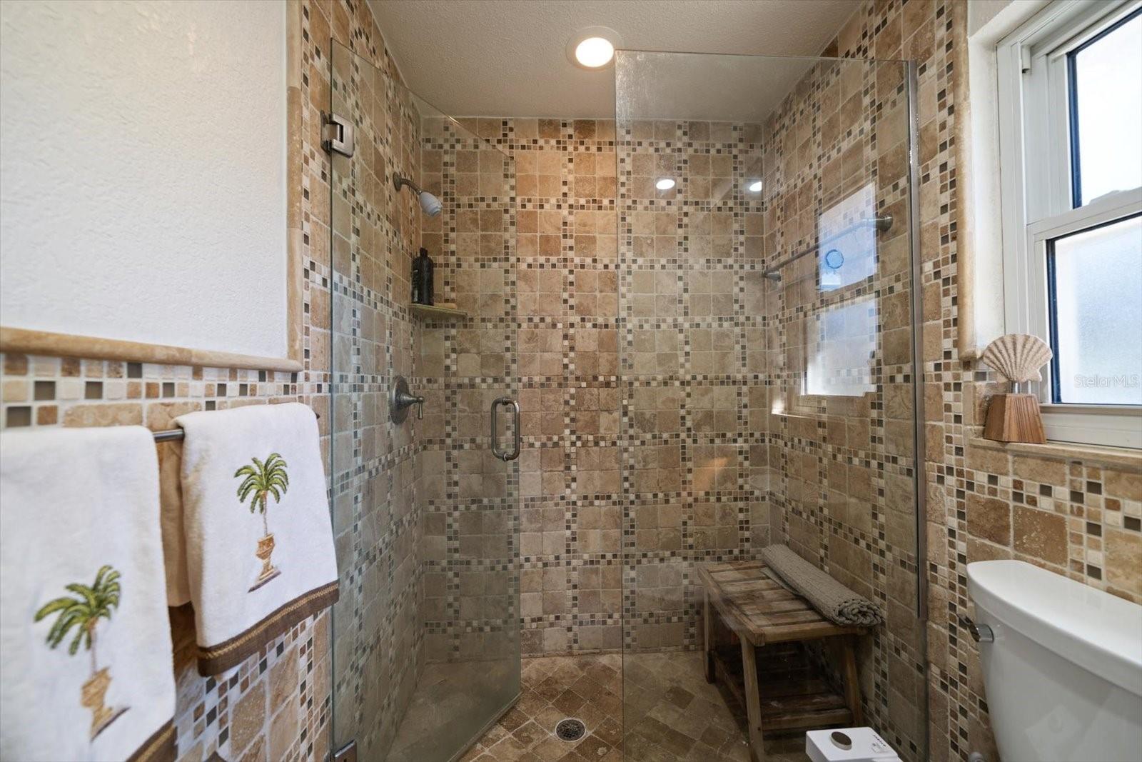 Master suite shower with space for a seated bench!