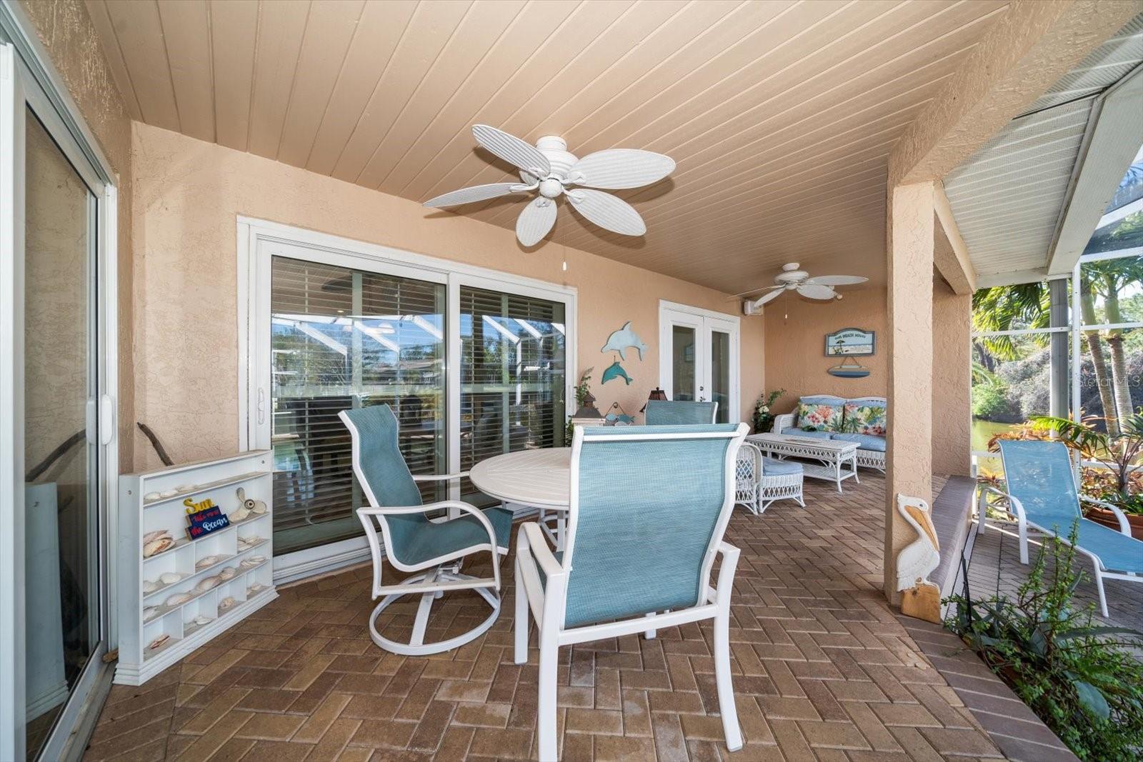 Covered patio areas in the pool area offer protection from the elements all while indulging in the stunning surrounding scenery.