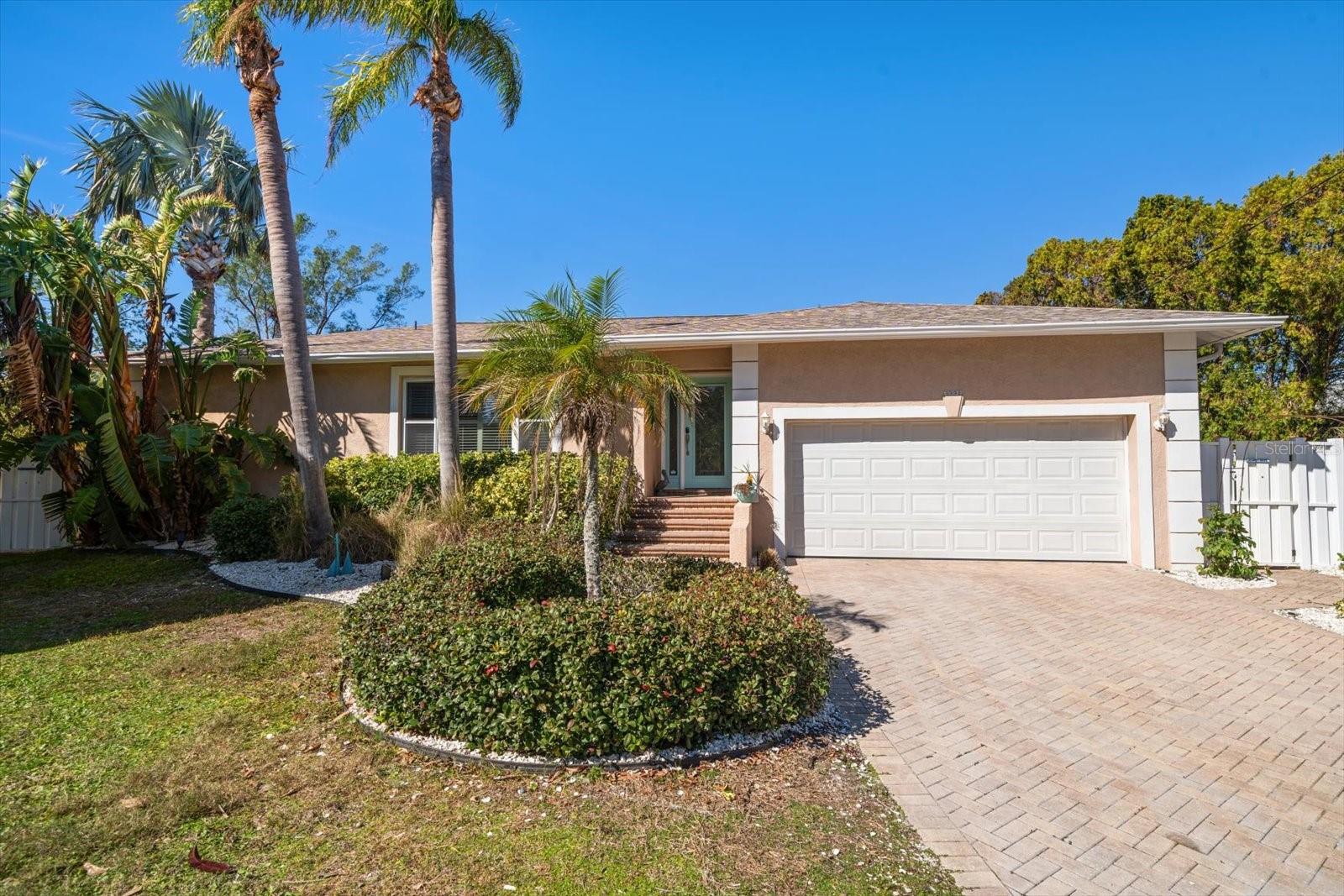 Newer features of this ranch style home with elevated living spaces, include electrical panel, AC work, new paint, dock and lift, and roof within the last 5 years!