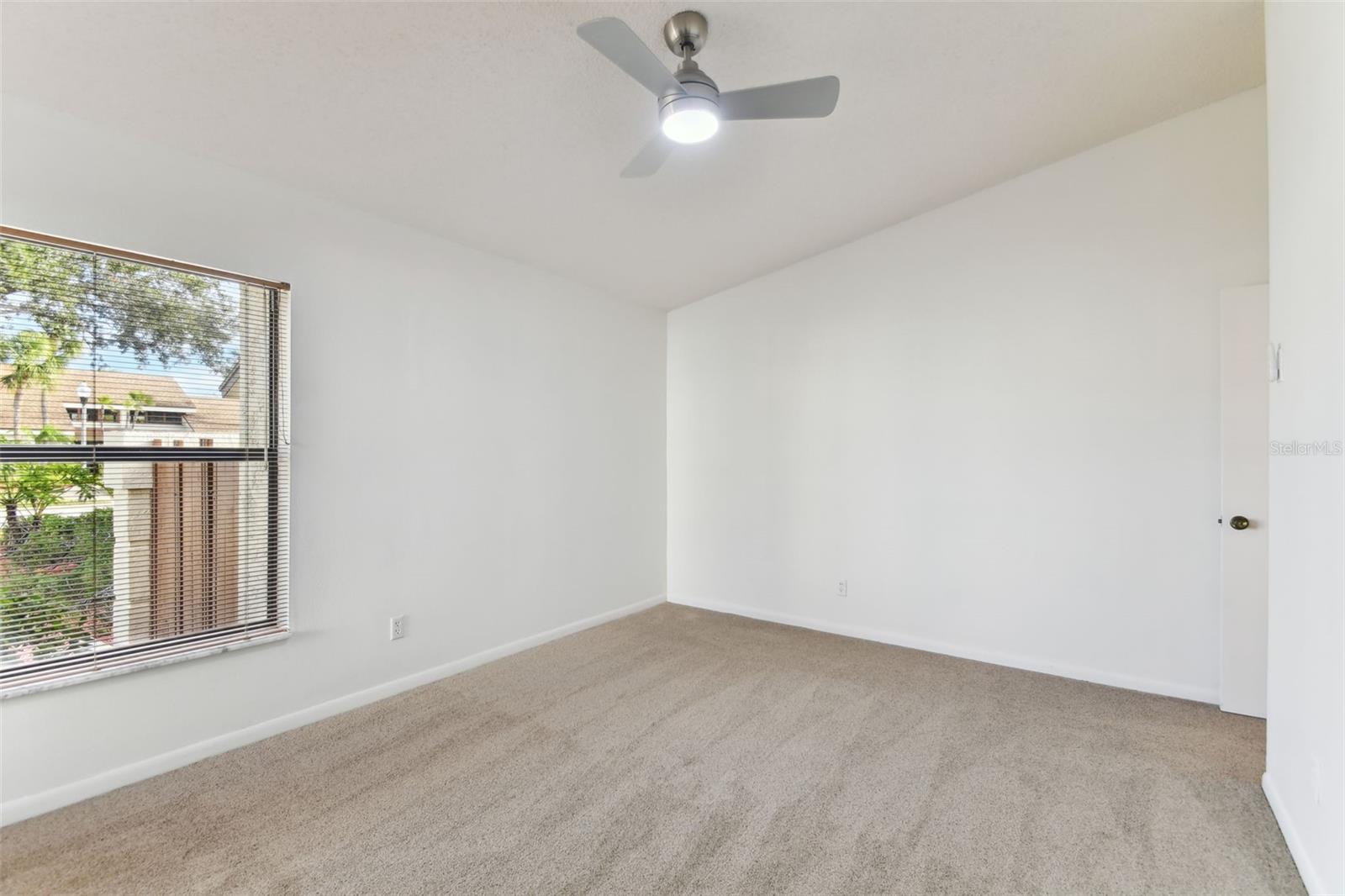 Main bedroom with vaulted ceilings