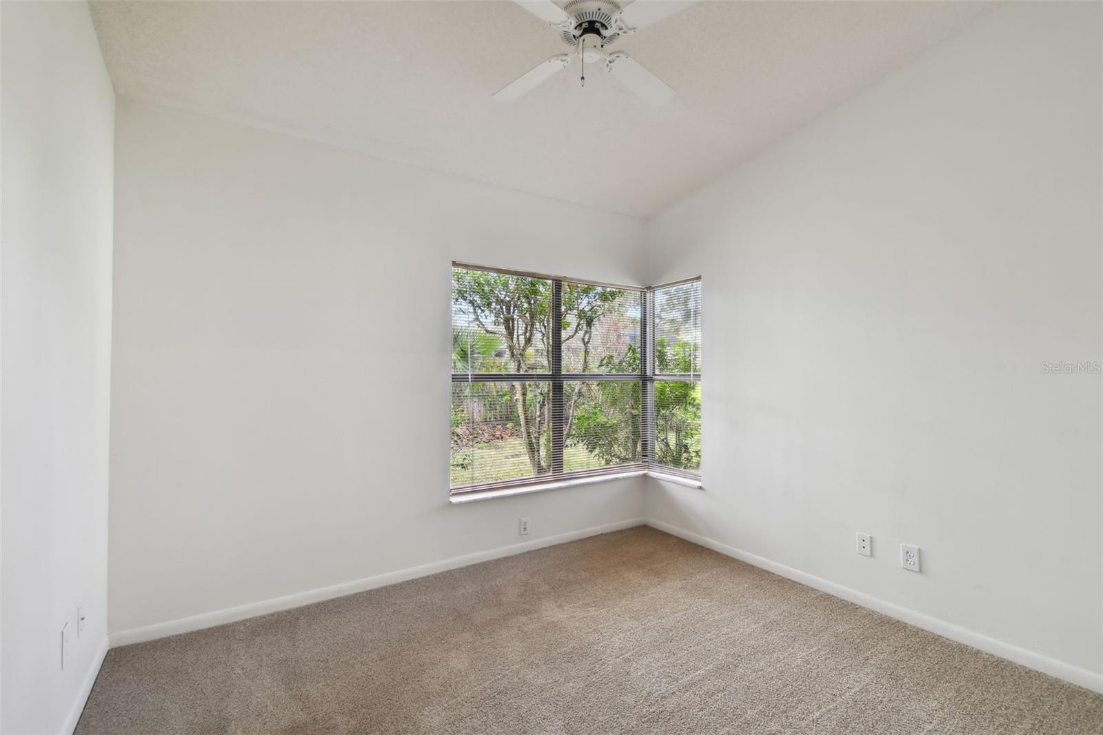 Rear bedroom also offers vaulted ceilings